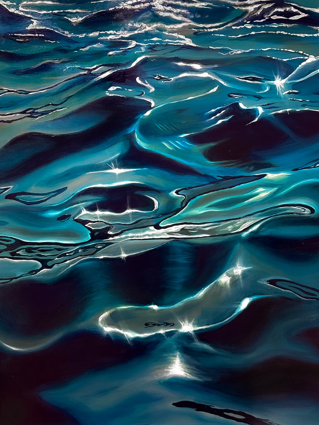 Ripples on water surface with reflections.