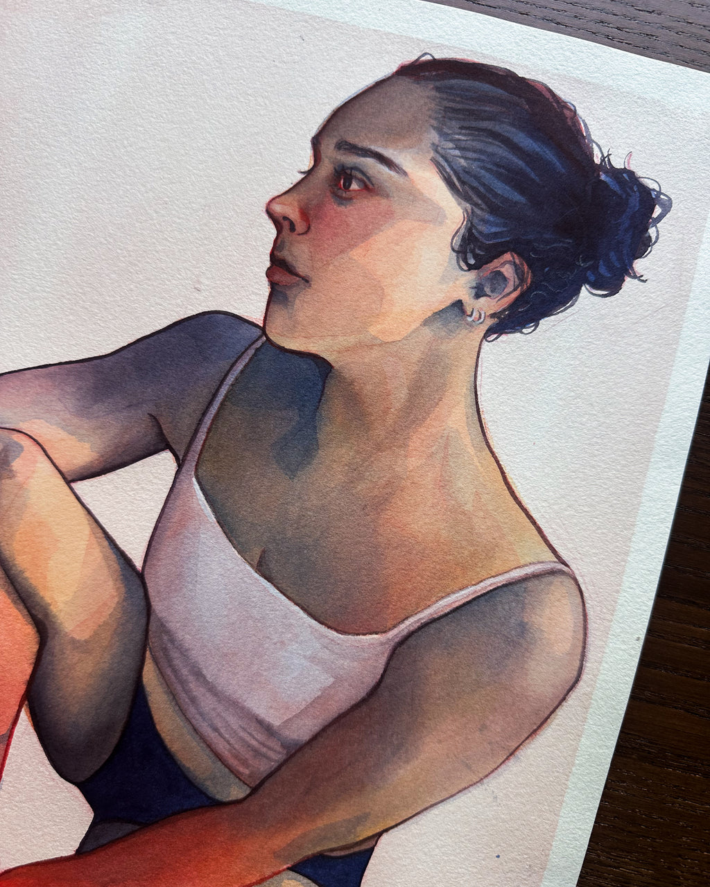 Artistic depiction of a woman in a white tank top.